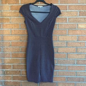 Black body con dress with small white polka dots, size small